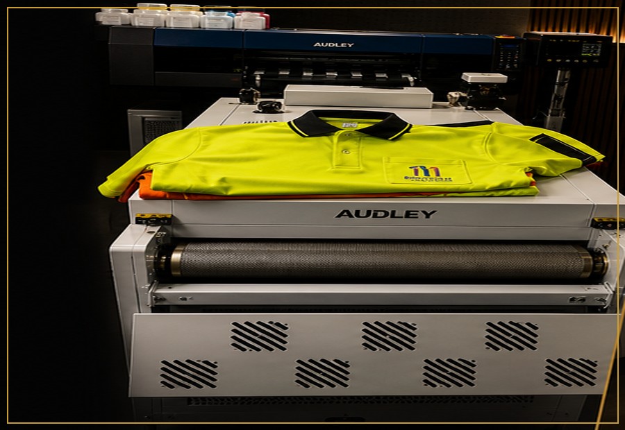 Urban Chic DTF printing machine with finished shirts